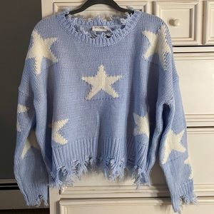 Storia blue distressed star sweater